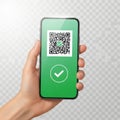 Hand holding smartphone with qr code and checkmark icon isolated on white background isolated on white background Royalty Free Stock Photo