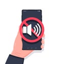 Hand holding smartphone sound off. No sound sign for mobile phone. Volume off or mute mode sign for smartphone. Royalty Free Stock Photo