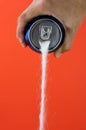 Can pouring sugar stream in calories content of soda energetic and refreshing drinks