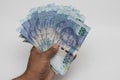 Hand holding south african rands Royalty Free Stock Photo