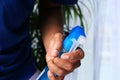 Hand holding spray bottle cleaning and disinfection for coronavirus Royalty Free Stock Photo