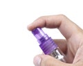 Hand holding a spray Royalty Free Stock Photo