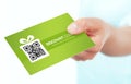 Hand holding spring discount card isolated over white Royalty Free Stock Photo