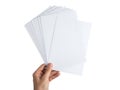 Hand holding a stack of blank white paper sheets Royalty Free Stock Photo