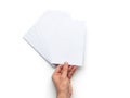Hand holding stack of blank white paper sheets Royalty Free Stock Photo