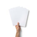 Hand holding stack of blank white paper sheets Royalty Free Stock Photo