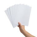 Hand holding a stack of white paper sheets Royalty Free Stock Photo