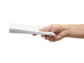Hand holding a stack of white paper sheets Royalty Free Stock Photo