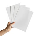 Hand holding stack of white paper sheets Royalty Free Stock Photo