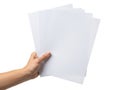 Hand holding a stack of white paper sheets Royalty Free Stock Photo