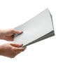 Hand holding a stack of white paper sheets Royalty Free Stock Photo