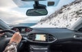 Hand holding steering wheel in luxury private car, Driving in ru