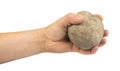 Hand holding stone ball