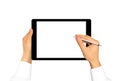 Hand holding stylus near graphic tablet blank screen. Empty tab Royalty Free Stock Photo