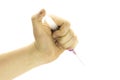 Hand holding syringe isolated