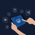 Person using tablet with cloud computing interface and floating icons Royalty Free Stock Photo