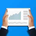 Hand holding tablet. businessman read data analysis spreadsheet for financial report with chart and graph