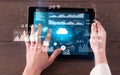 Hand holding tablet and checking finantial report concept Royalty Free Stock Photo