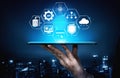 Hand Holding Tablet with Digital Icons Representing Technology, Data Analysis, Cloud Computing, and Artificial Royalty Free Stock Photo