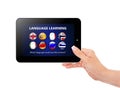 Hand holding tablet with language learning page over white Royalty Free Stock Photo