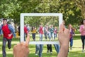 Composite image of hand holding tablet pc Royalty Free Stock Photo