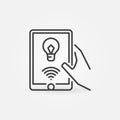 Hand holding Tablet with smart bulb app vector outline icon Royalty Free Stock Photo
