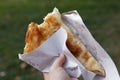 Eating banitsa outdoors Royalty Free Stock Photo