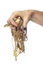Hand Holding Tangled Mess of Jewelry Royalty Free Stock Photo