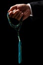 Hand Holding a Tasbih