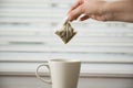 hand holding tea bag. High quality photo Royalty Free Stock Photo