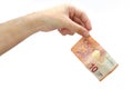 Hand holding a ten euros banknote isolated on Royalty Free Stock Photo