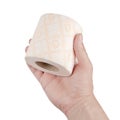 Hand holding toilet paper over white background Royalty Free Stock Photo