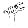 Hand holding tool monkey wrench in black and white Royalty Free Stock Photo