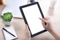 Hand holding and touching on tablet screen, Tablet mockup for we Royalty Free Stock Photo