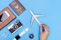 Hand holding toy plane for travel object Royalty Free Stock Photo