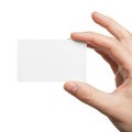 A hand holding a transparent, rectangular object against a plain background Royalty Free Stock Photo