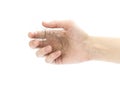 Hand holding a tuft of hair. Close up. Isolated on a white background Royalty Free Stock Photo