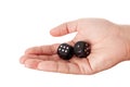 Hand holding two black dices Royalty Free Stock Photo