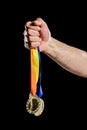 Hand holding two olympic gold medal Royalty Free Stock Photo