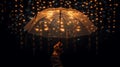 Hand holding umbrella surrounded in fairy lights