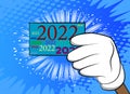 Hand holding up a banner with 2022. Future business career, New Year goals, goal concept Royalty Free Stock Photo