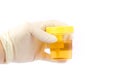 Hand holding a urine sample Royalty Free Stock Photo