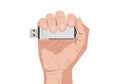 Hand holding a usb flash drive, a portable data storage device for digital information Royalty Free Stock Photo