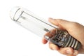 Hand Holding a Used High Intensity Discharge Lamp Royalty Free Stock Photo