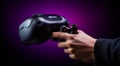 hand holding video controller, close-up of hand holding gamepad, gamer playing game with gamepad