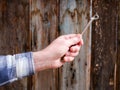 Hand holding wrench on a wooden background, Husky Metric Drive Ratcheting Royalty Free Stock Photo