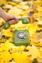 Hand holding vintage phone Royalty Free Stock Photo