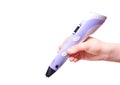 Hand holding violet 3D drawing pen printer on white background. Copy space for text Royalty Free Stock Photo
