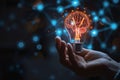 Hand holding virtual lightbulb with brain creative, smart thinking concept Royalty Free Stock Photo