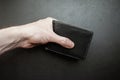 Hand holding a wallet. Royalty Free Stock Photo